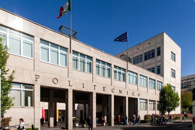 The entrance of Politecnico di Torino, with POLITECNICO in large letters over the portico.