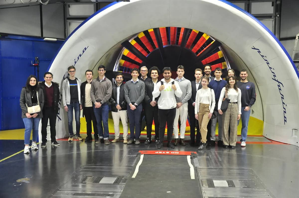 Team members inside Pininfarina's wind tunnel in Grugliasco.