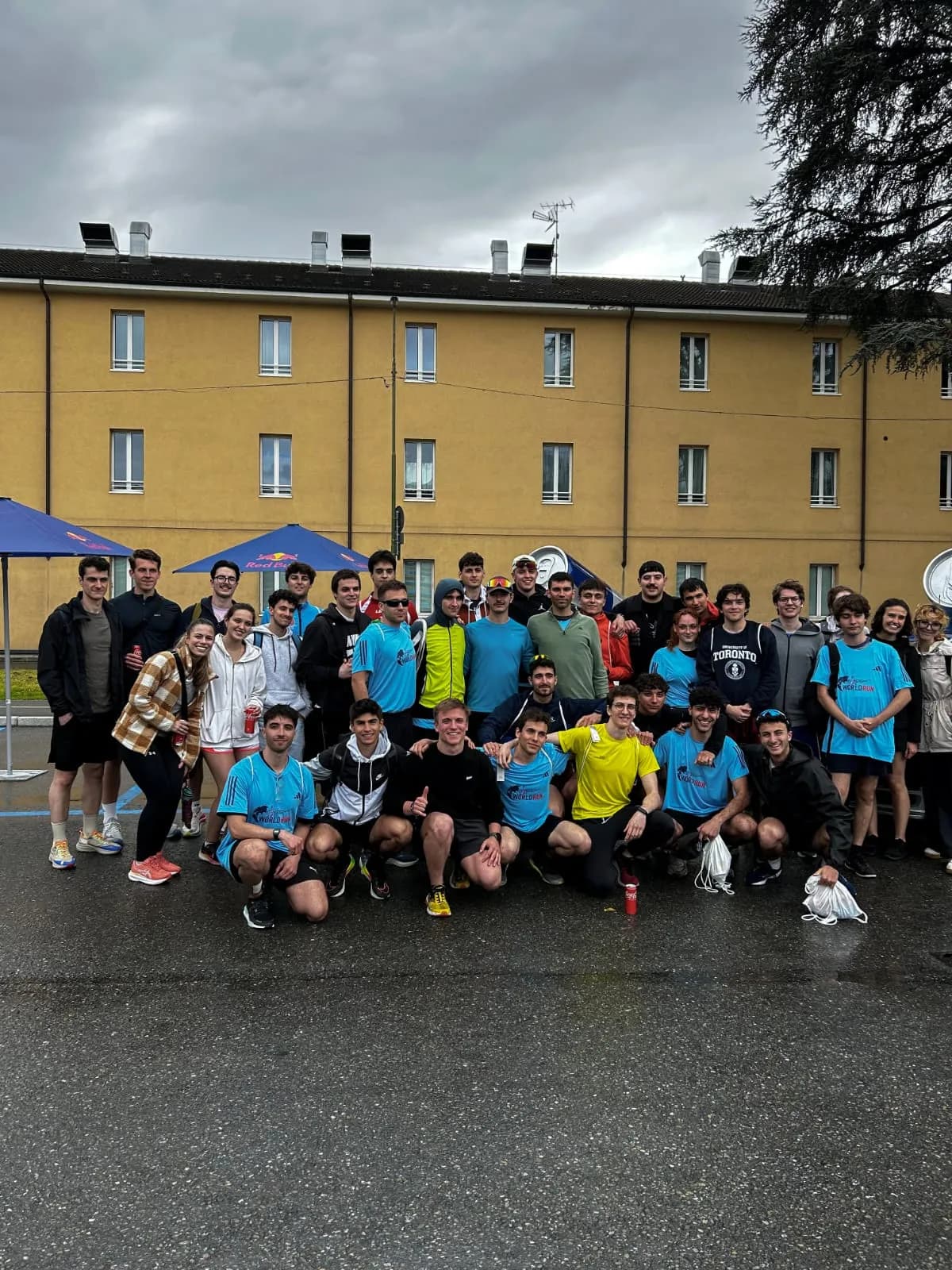 About thirty team members in running gear at the Wings for Life World Run in Aosta.
